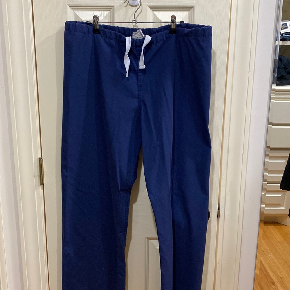 Urbane scrub pants, navy women, medium, minor pull on the end, very little wear